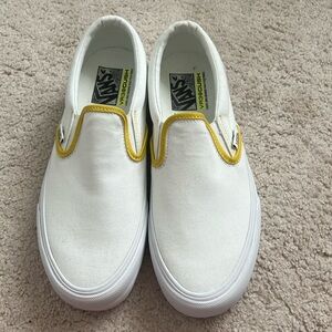 Brand new white vans slip ons